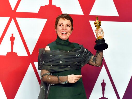 Olivia Colman poses with the award for best performance by an actress in a leading role for Olivia Colman poses with the award for best performance by an actress in a leading role for
